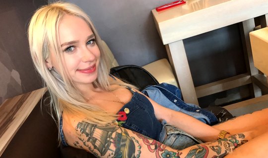Tattooed blonde is not against a pickup and is ready to fuck...