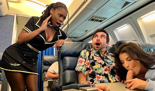 Ebony stewardess helps a white chick please a guy...
